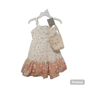 Tahari Easter White Floral Tiered Sundress with Bow and Pink-Orange Hem.